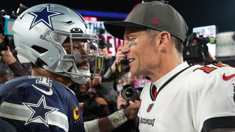 Dak Prescott and Tom Brady meet in the middle of the field following the Cowboys' 31-14 wild card win over the Buccaneers in the NFL playoffs