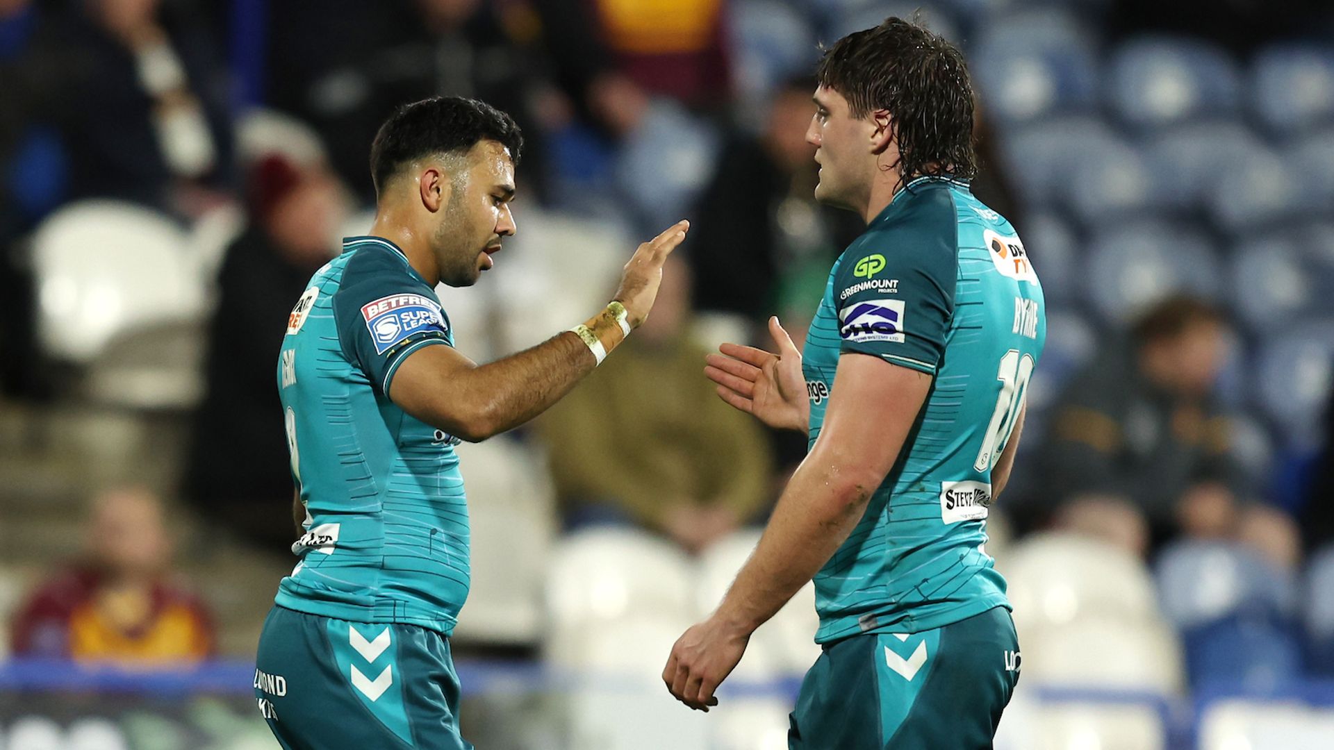 Wigan edge to win at Huddersfield; Warrington smash Leigh