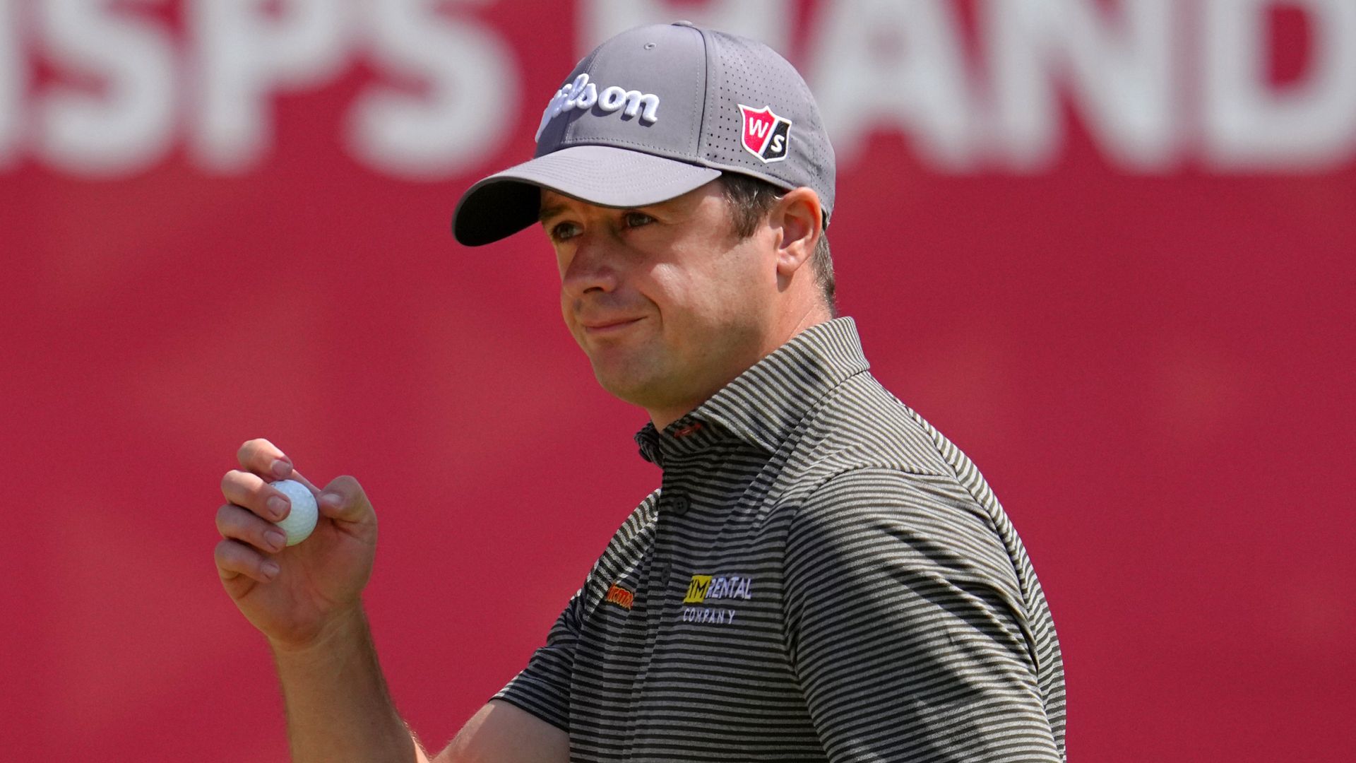 Law one-shot off lead in Japan as he gives injury update
