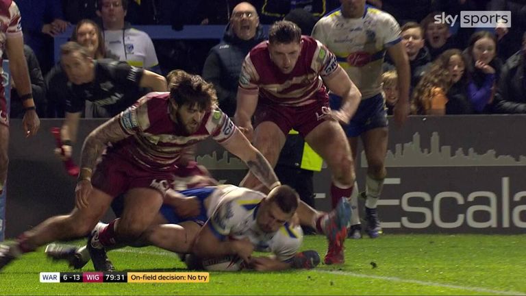 Warrington's players and fans were left aghast as Greg Minikin had a late try ruled out by the video referee for a knock-on