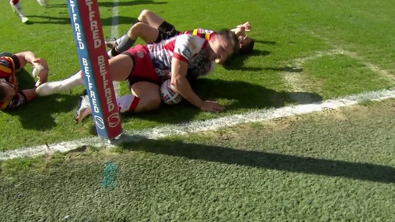 Tom Briscoe powers through the Salford Red Devils' defence to keep them in the game