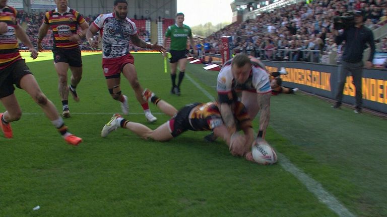 Josh Charnley gets his second try of the game after it went  to the video referee