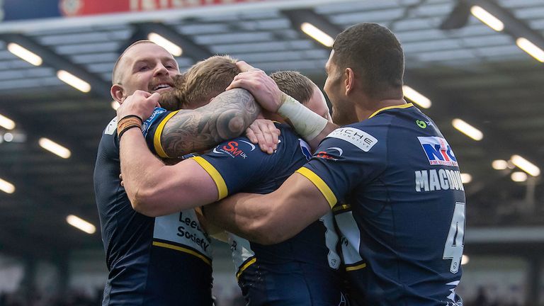 Leeds Rhinos fought back in the second half to seal a dramatic 18-7 win over Huddersfield Giants