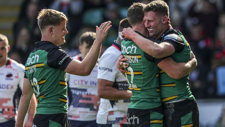 Northampton's Fraser Dingwall (right) celebrates after scoring for Northampton Saints against Saracens