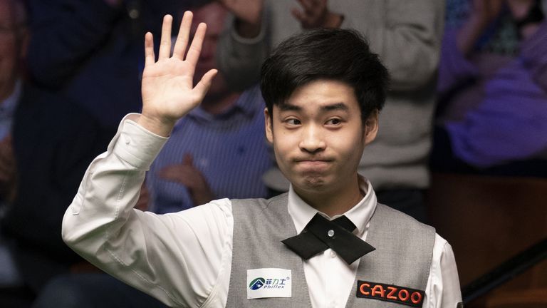 Si Jiahui followed his first-round win over Shaun Murphy with a victory over Robert Milkins at The Crucible