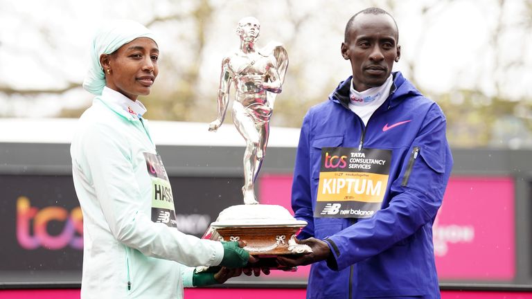 Sifan Hassan (left) and Kelvin Kiptum (right) celebrate winning the women's and men's London Marathon races, respectively 