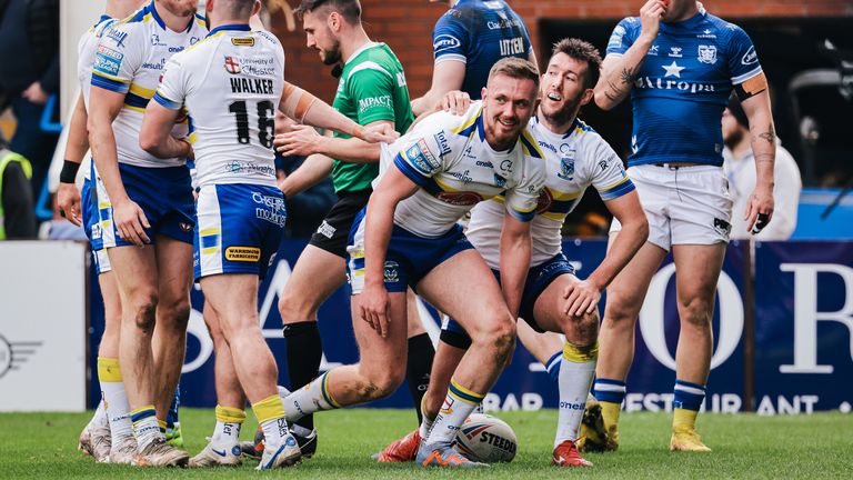 Ben Currie celebrates his try with Stefan Ratchford