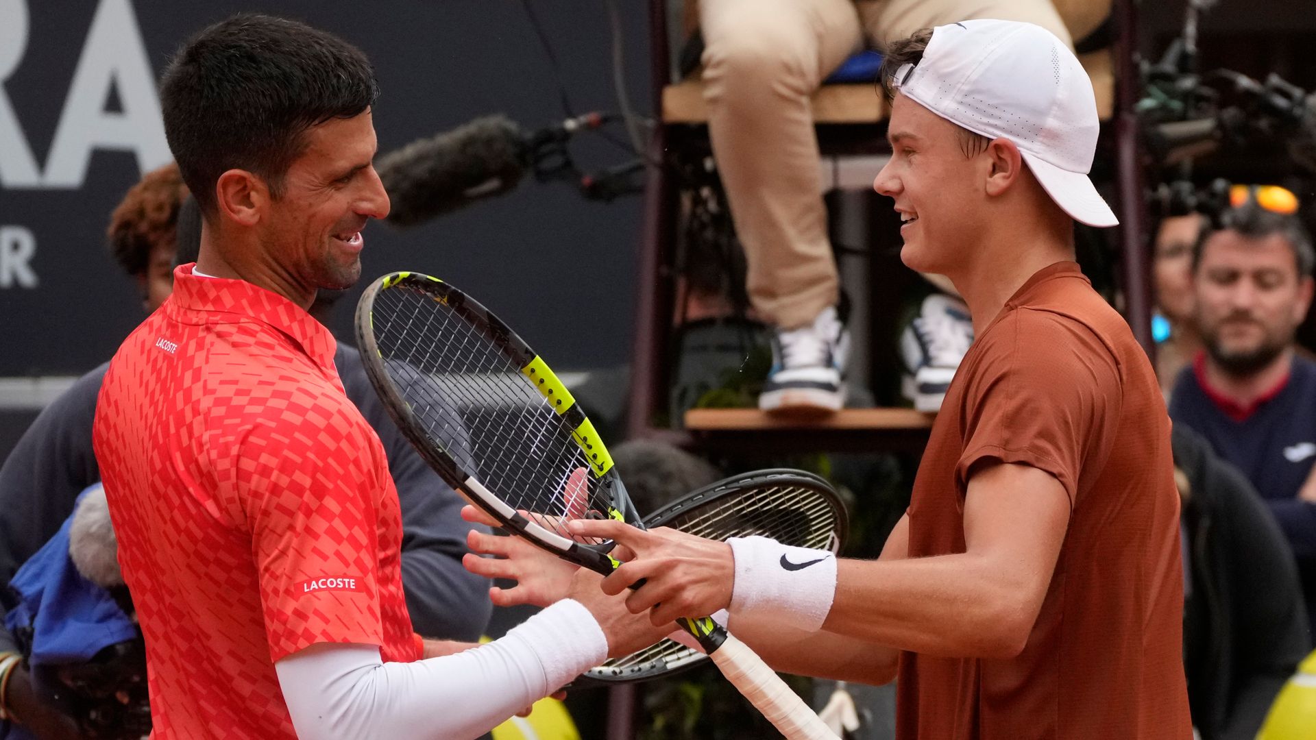Danish delight as Rune shocks off-colour Djokovic in rainy Rome