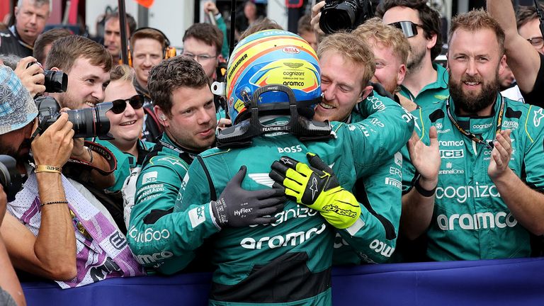 Fernando Alonso celebrates his third place at the Miami GP with Aston Martin