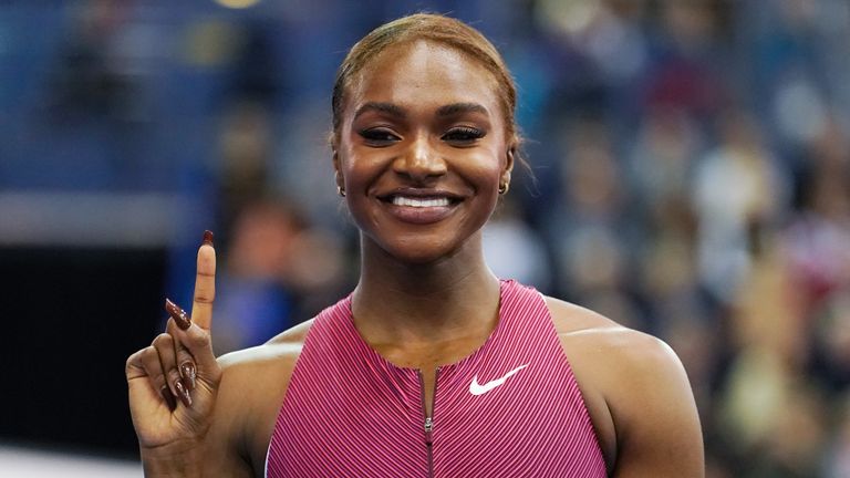 Dina Asher-Smith celebrates victory after winning the Birmingham World Indoor Tour final