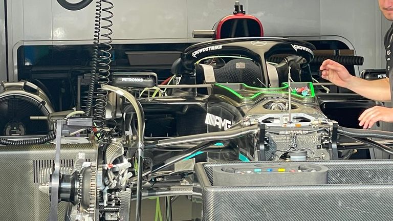 Mercedes' upgraded W14 being put together in the garage in Monaco