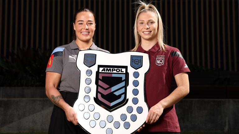 NSW's Isabelle Kelly and Queensland star Tarryn Aiken with the Women's State of Origin shield