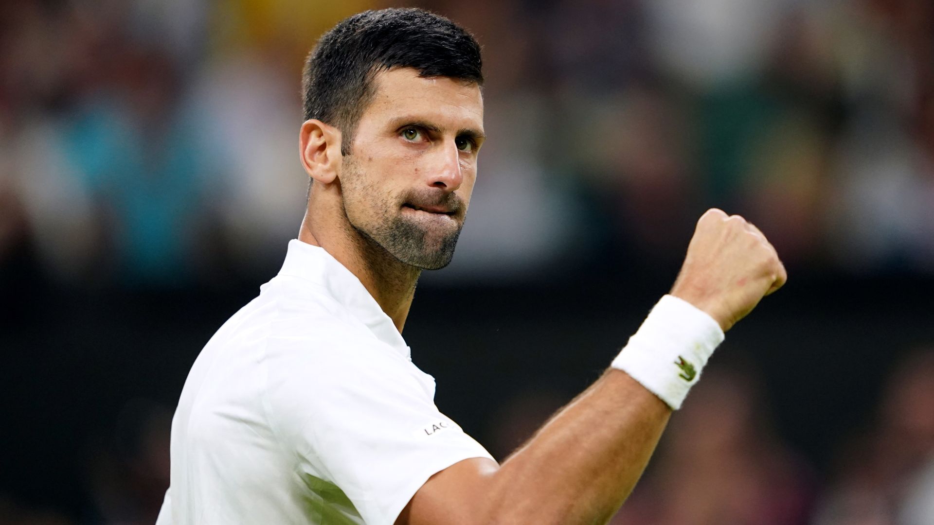 Djokovic to conclude 100th Wimbledon match on Monday as curfew suspends play