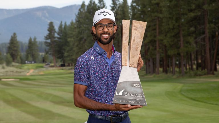 Akshay Bhatia holds the trophy after winning the Barracuda Championship