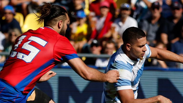 Argentina's Thomas Gallo is chased by Chile's Javier Eissmann