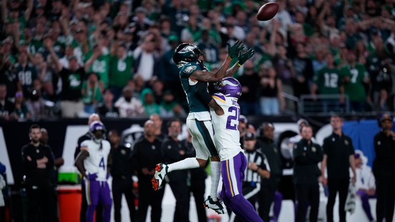 Philadelphia Eagles' Devonta Smith makes this brilliant highlight play, leaping above Theo Jackson to bring in the 54-yard dart from Jalen Hurts.