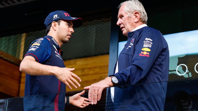Sergio Perez and Helmut Marko in discussion at the British GP in July