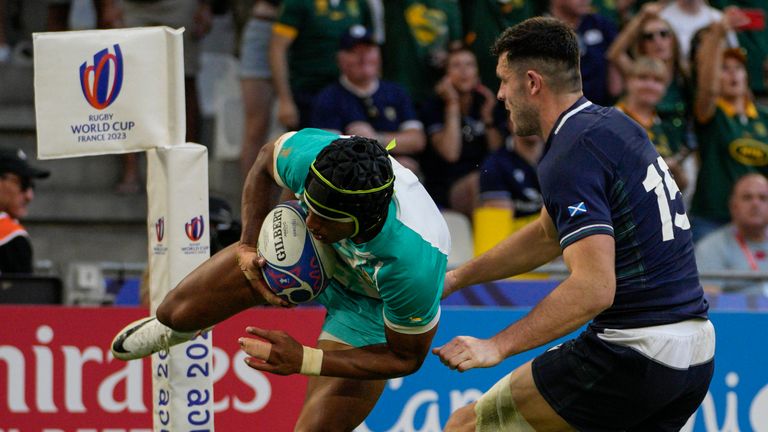 South Africa's Kurt-Lee Arendse scores a try during the Rugby World Cup match against Scotland 