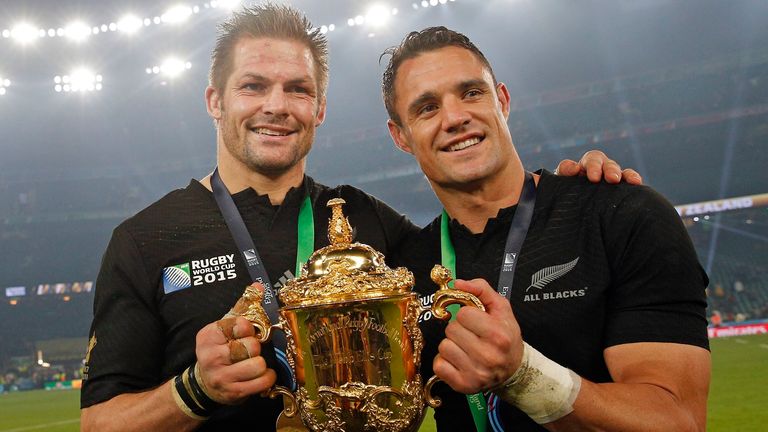 Richie McCaw (left) and Carter celebrate New Zealand's World Cup triumph in 2015