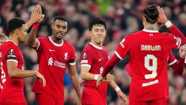 Liverpool's Wataru Endo, centre, celebrates after scoring his side's second goal against Toulouse