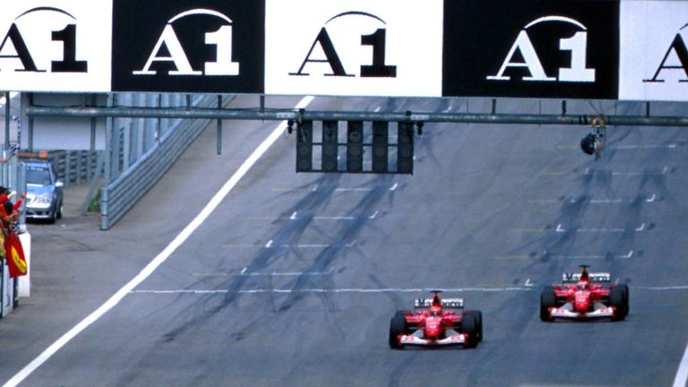 Rubens Barrichello lets Michael Schumacher through at the 2002 Austrian Grand Prix