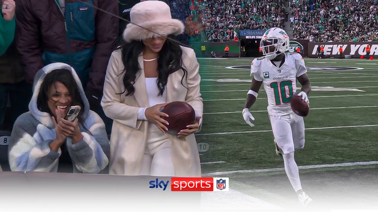 Hill scored the opening touchdown for the Dolphins then handed the ball to his newlywed wife