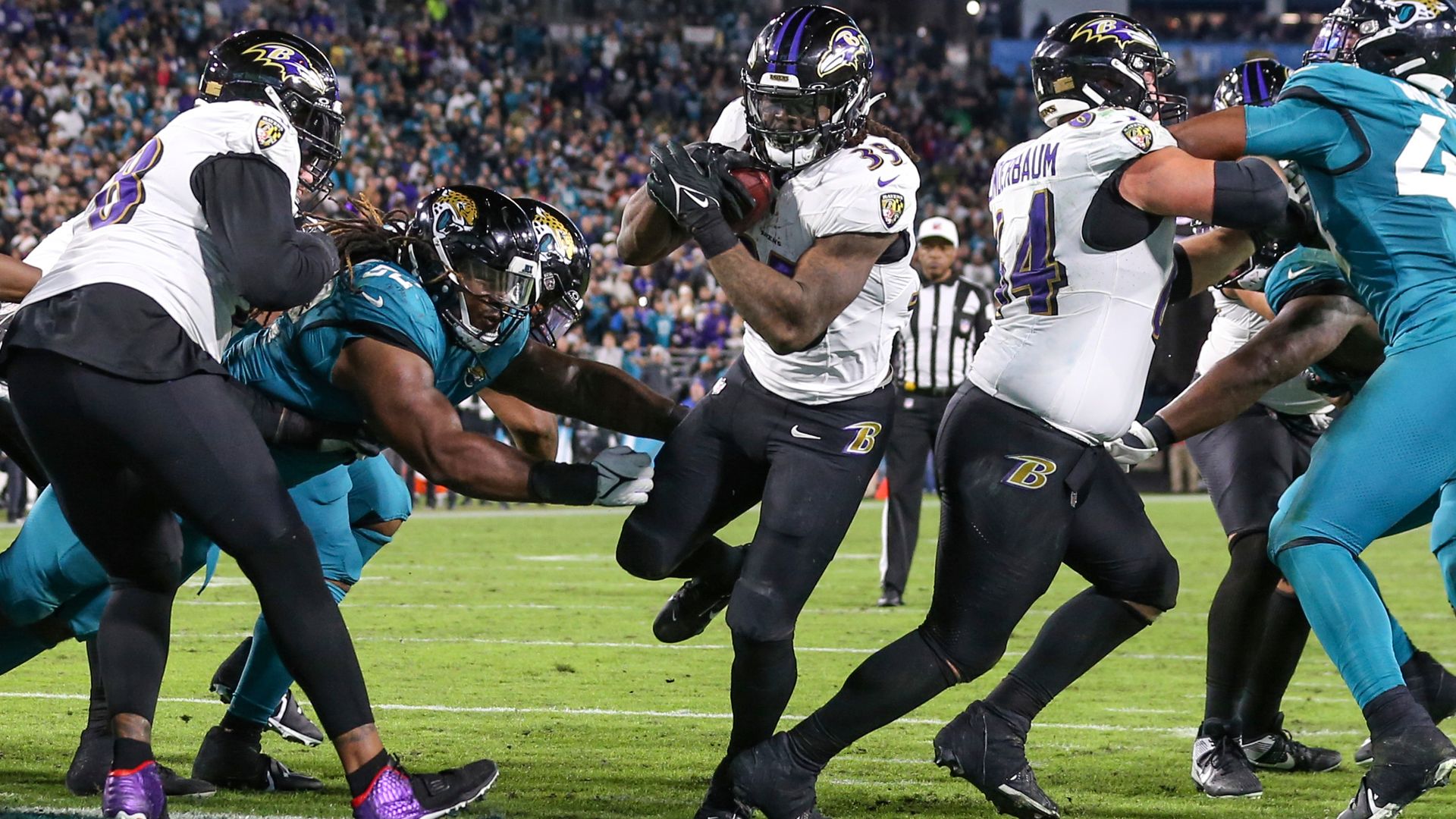 Ravens clinch playoff spot with win over error-prone Jaguars