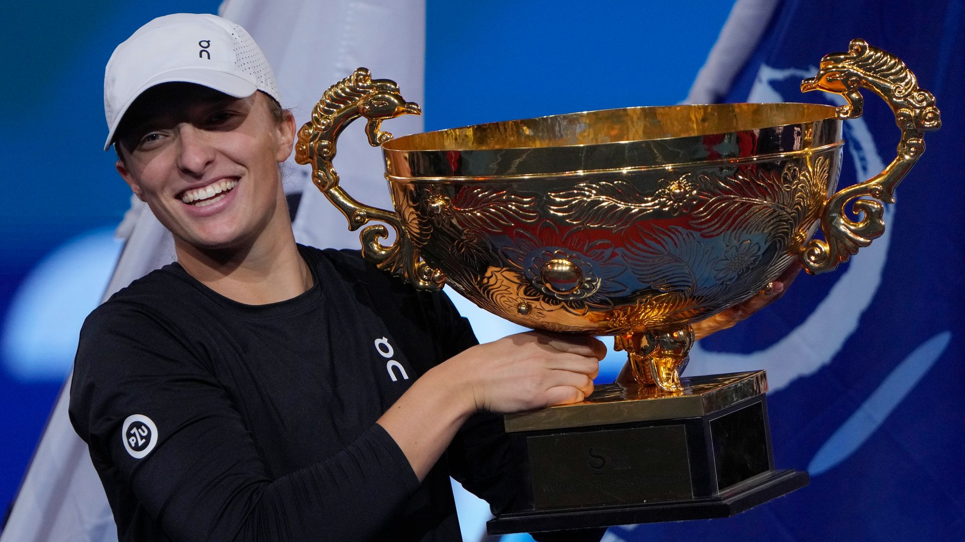 Swiatek hopes women's 'Big Three' will remain at summit of tennis