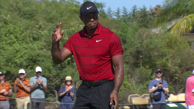 Tiger Woods drains the birdie putt from 34 feet out on the par-three fifth at the Hero World Challenge