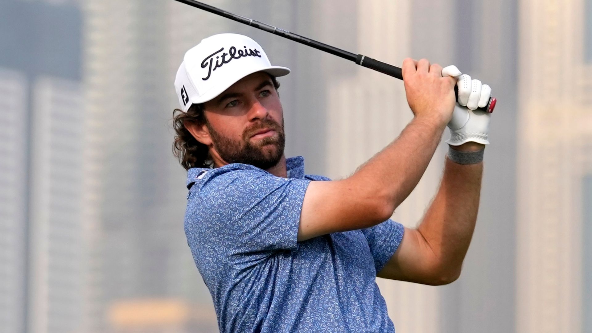 Young holds lead as McIlroy struggles at Dubai Desert Classic