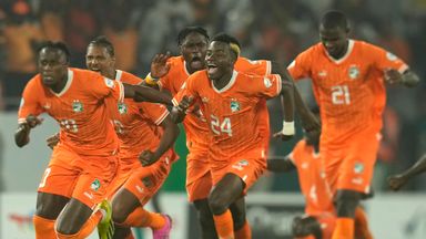 Ivory Coast players celebrate after defeating Senegal