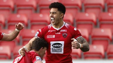 Sam Stone celebrates Salford Red Devils' first try of the game