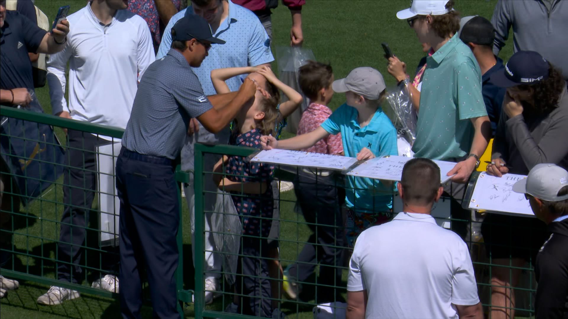 Fowler autographs young fans' foreheads at The Players!