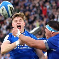 Stephen Varney of Italy celebrates scoring his team's third try with team-mate Danilo Fischetti
