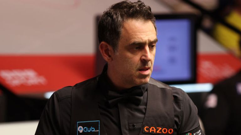 Ronnie O'Sullivan chalks the cue against Ryan Day in their round two match during day nine of the Cazoo World Snooker Championship 2024