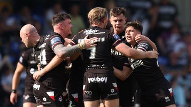 London Broncos players celebrate their first win of the season after beating Hull FC