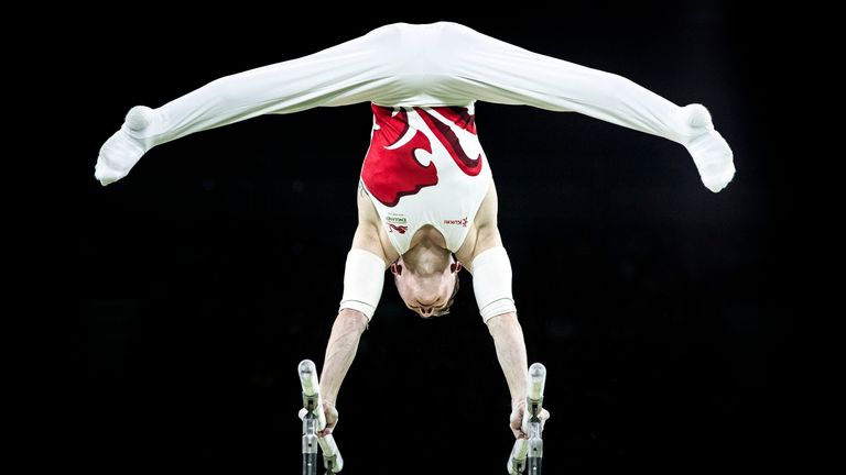 England's Nile Wilson won silver on the men's parallel bars at the 2018 Commonwealth Games on the Gold Coast, Australia