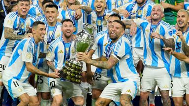 Argentina players celebrate with the trophy after defeating Colombia in the Copa America final