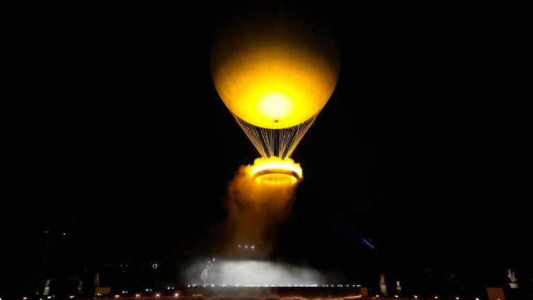 A balloon lifted the flame into the Paris sky at the 2024 Olympic opening ceremony
