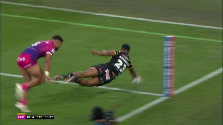 Jason Qareqare gets the first points for Castleford with an acrobatic dive in at the corner against the Giants