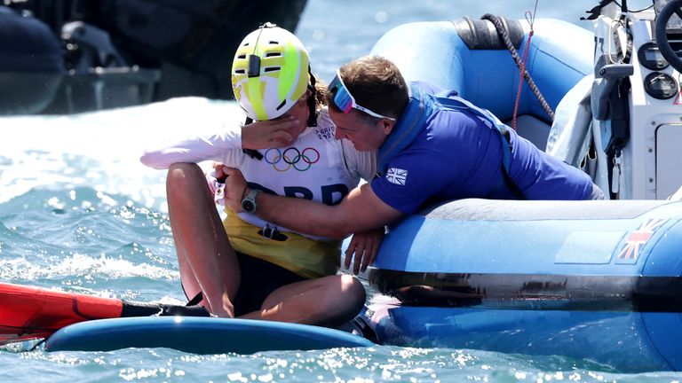 Emma Wilson broke down in tears after crossing the finish line and earning a bronze medal in windsurfing