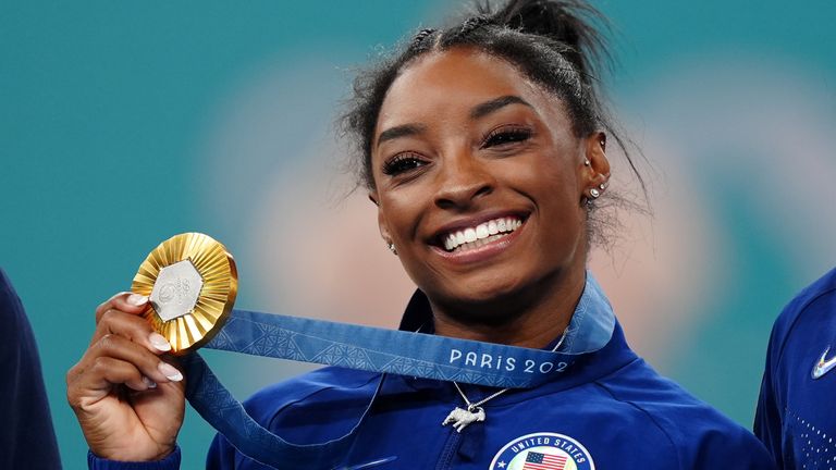 Simone Biles celebrates an incredible sixth Olympic gold medal