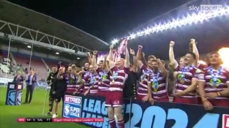 Wigan Warriors beat Salford Red Devils 64-0 to lift trophy