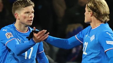 Iceland's Logi Tomasson (left) celebrates after scoring against Wales