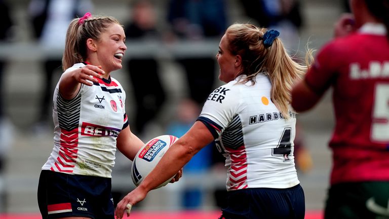 England's Eboni Partington (left) celebrates scoring a try against Wales