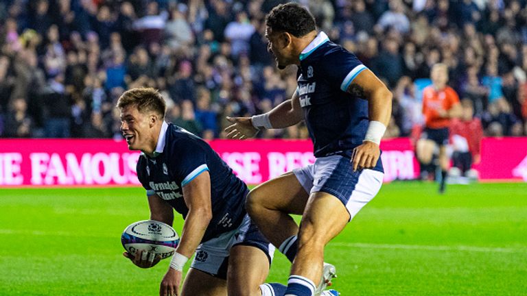 Sione Tuipulotu congratulates Huw Jones after his try against Fiji