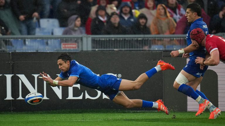 Ange Capuozzo scored the opening try with a stunning diving finish in Rome