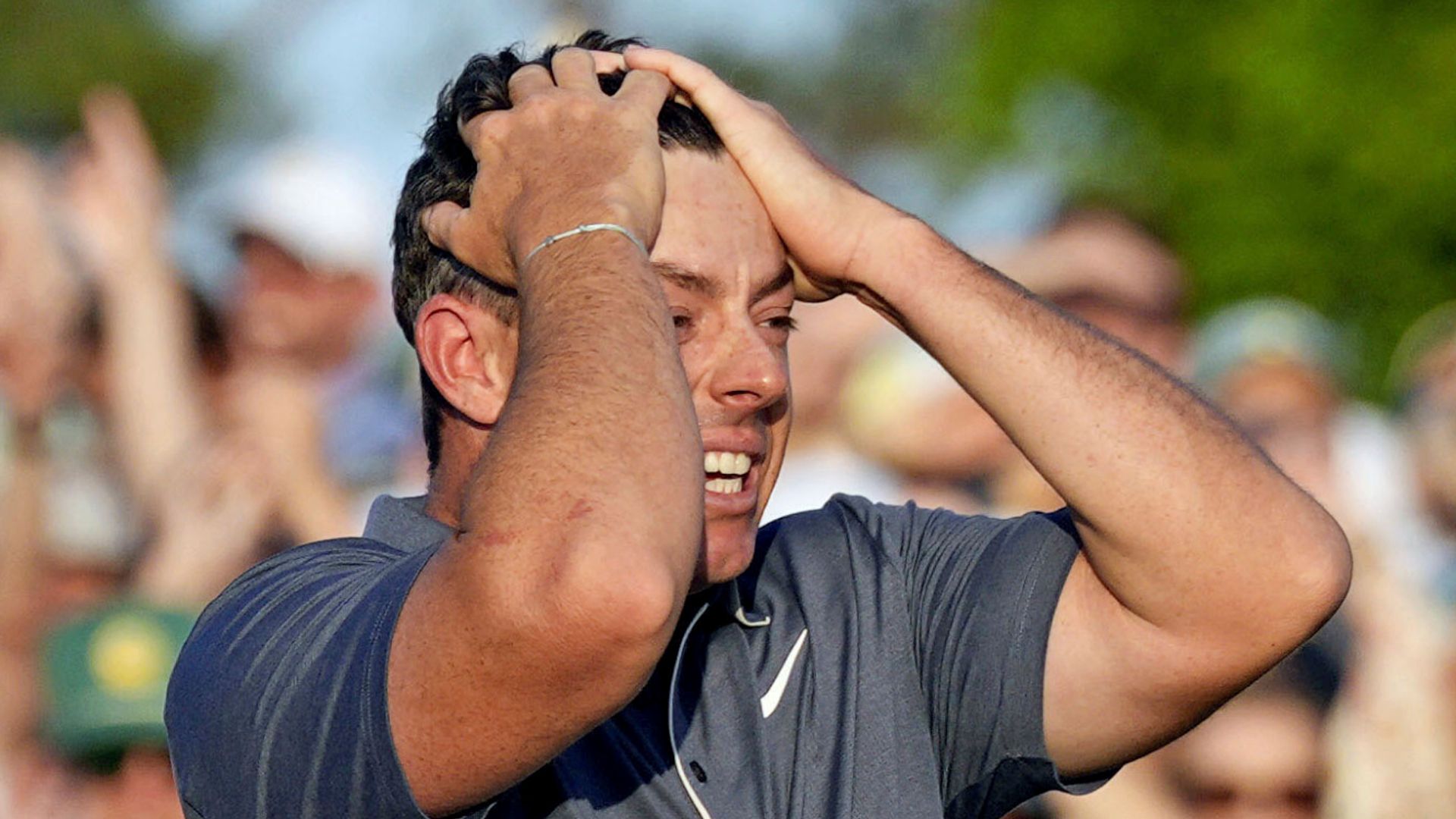 Tears, pay phones and the story of a generation - watching McIlroy make history