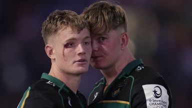 A bloodied Fin Smith (left) and Henry Pollock watch on after Northampton Saints suffered heartache to Bordeaux-Begles in the Champions Cup final