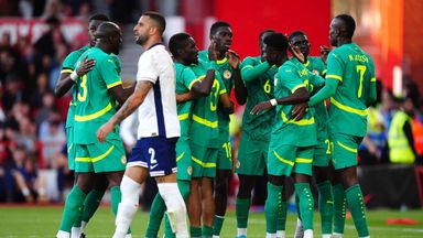 Kyle Walker reacts after Ismaila Sarr's equaliser for England against Senegal